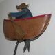 Old fishing counter balance toy in a boat