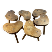 Set of 6 brutalist solid oak tripod farm stools from the 1950s