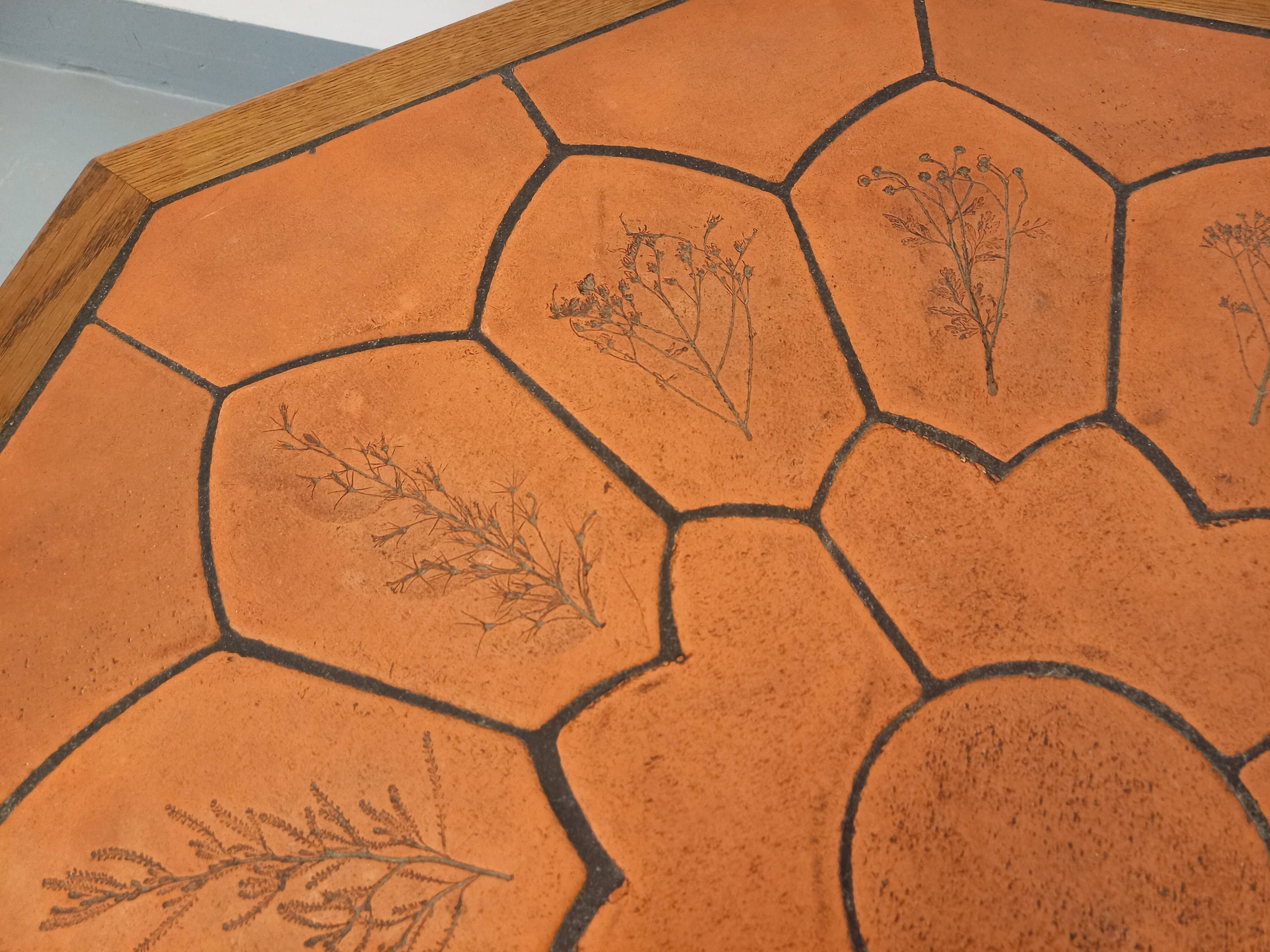 Octagonal coffee table Barrois with vintage herbarium patterns in oak and ceramic.