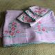Embroidered tablecloth and 3 towels