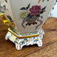 Porcelain vase with flower decorations by Dawen Wang.