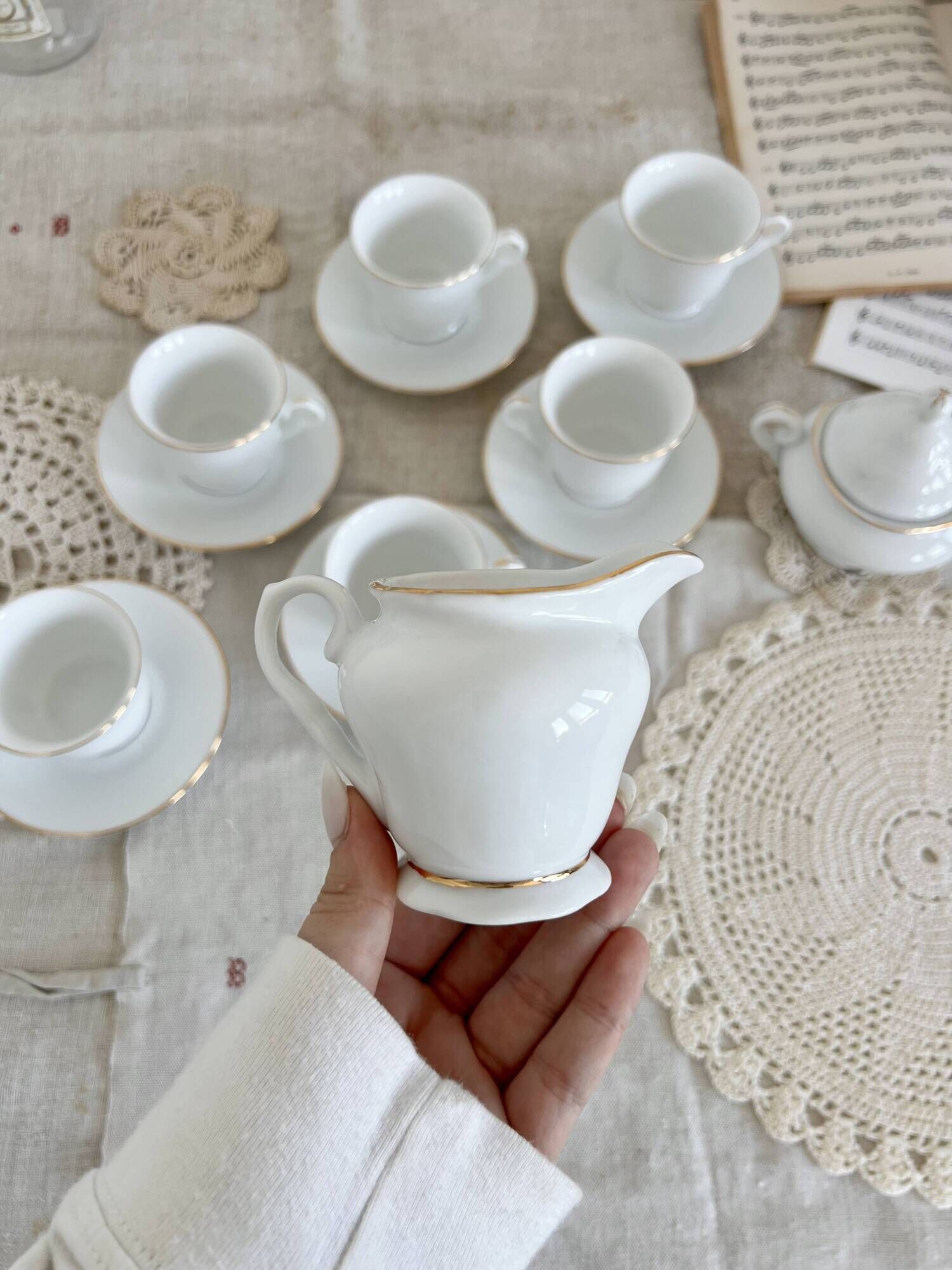 Vintage porcelain tea/coffee service with gold edging for 6 people, sugar bowl and milk jug