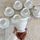 Vintage porcelain tea/coffee service with gold edging for 6 people, sugar bowl and milk jug