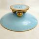 Art Deco modernist coupe, with a base of 3 spheres, in turquoise ceramic and gilding.