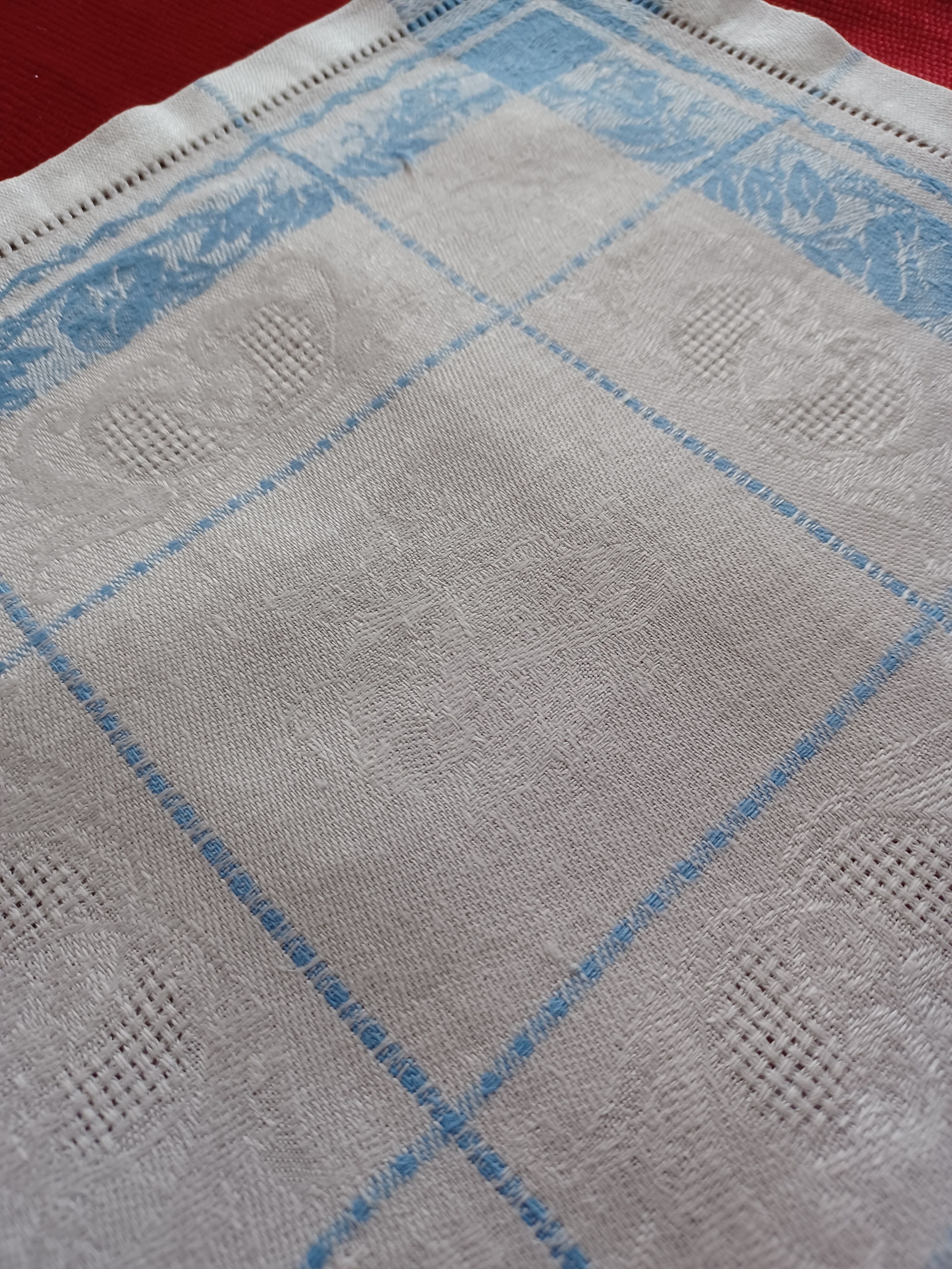 White and sky blue damask tablecloth and 10 towels