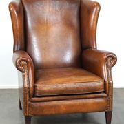 Fauteuil à oreilles particulièrement confortable en cuir de mouton, couleurs époustouflantes
