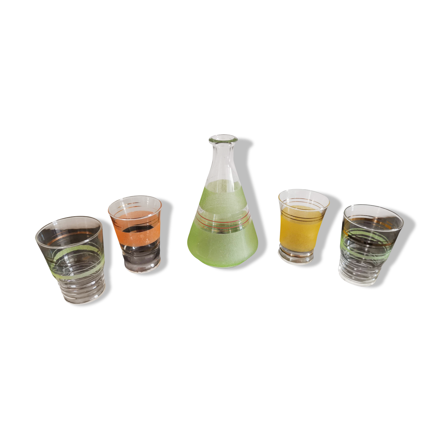Set of 4 colored granite glasses with its carafe