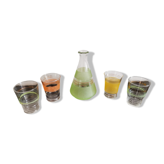 Set of 4 colored granite glasses with its carafe