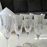 Lot of 4 x Large Champagne Flutes "Calp Concerto Champagne", in crystal chiseled with diamond patterns and diamond point finish. Height 21 cm