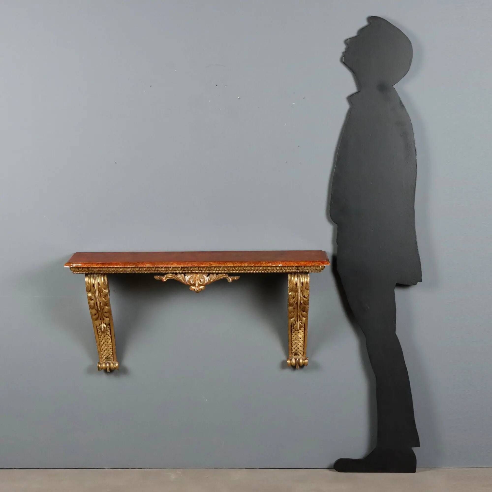 Old carved and gilded wooden console, Italy, 19th century.