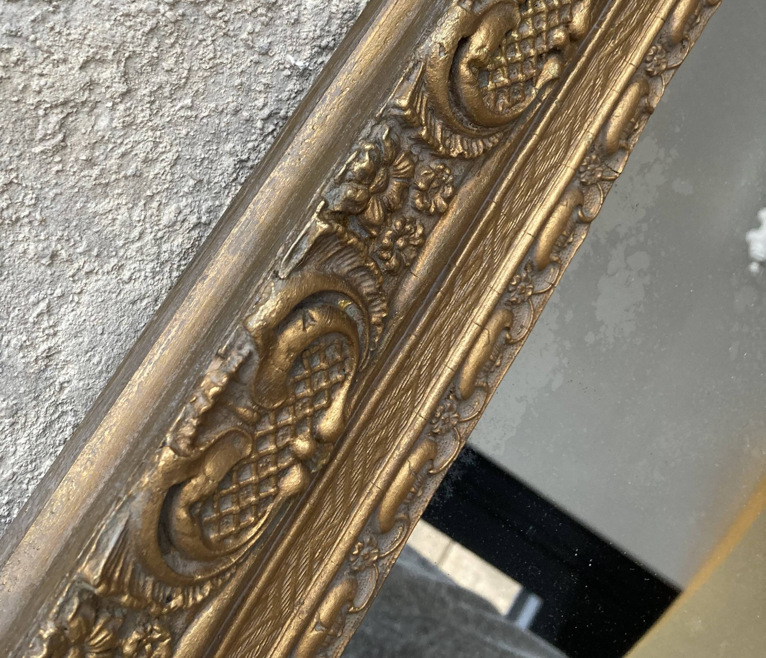 Gilded mirror in wood and stucco, 19th century, 60x88cm