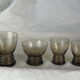 Set de 17 verres fumés noirs sur pied à gravure géométrique - années 70