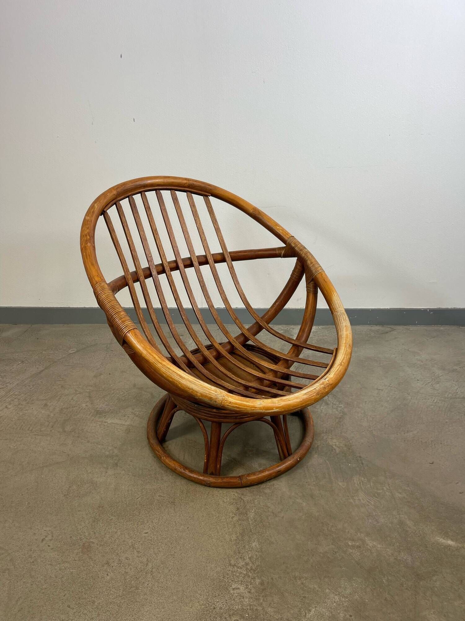Vintage rattan swivel saucer armchair from the 70s