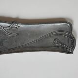 Art Nouveau pocket emptier