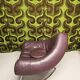 Chili leather armchair with ottoman by Paul Falkenberg