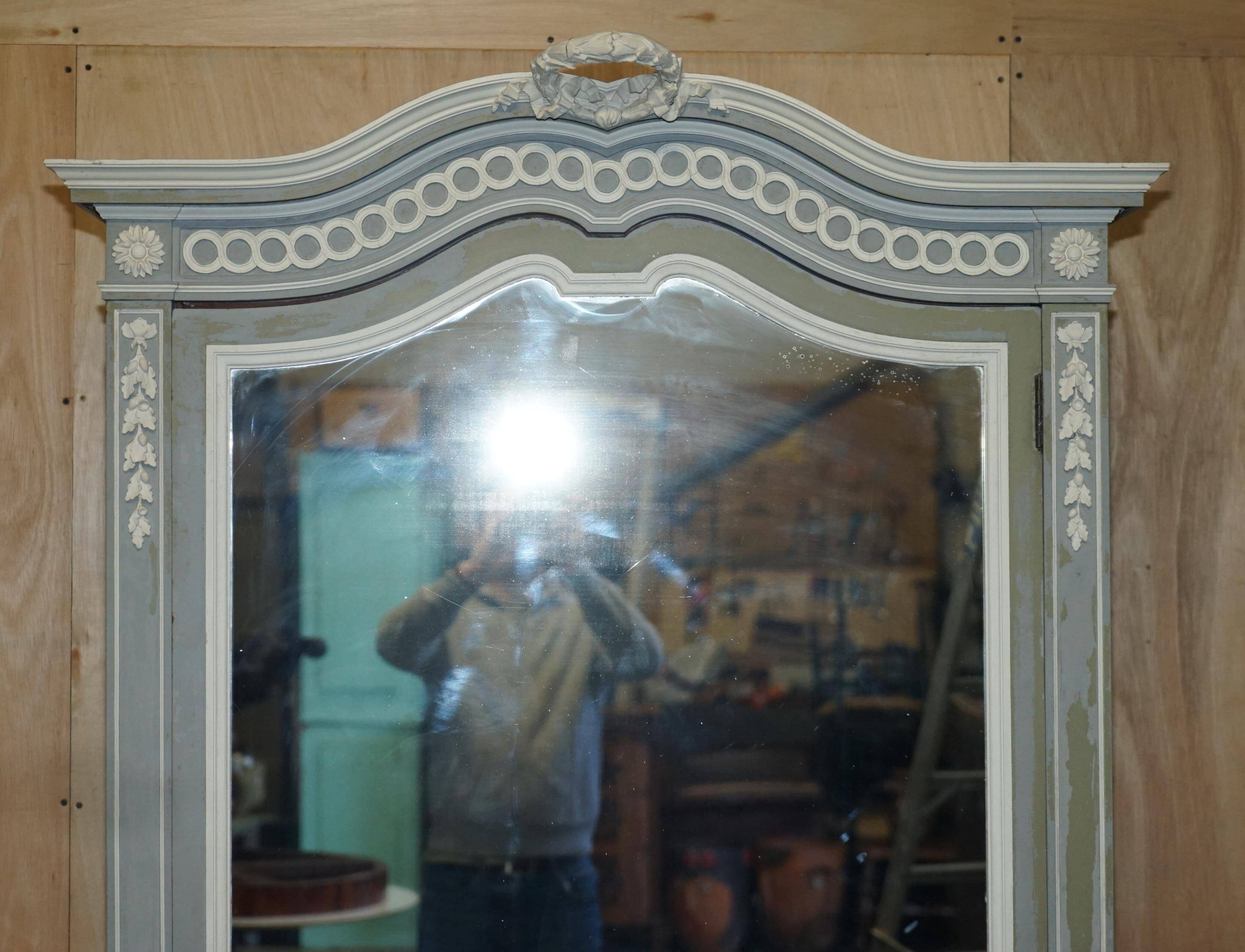 Antique wardrobe Mellier & Co with mirror door