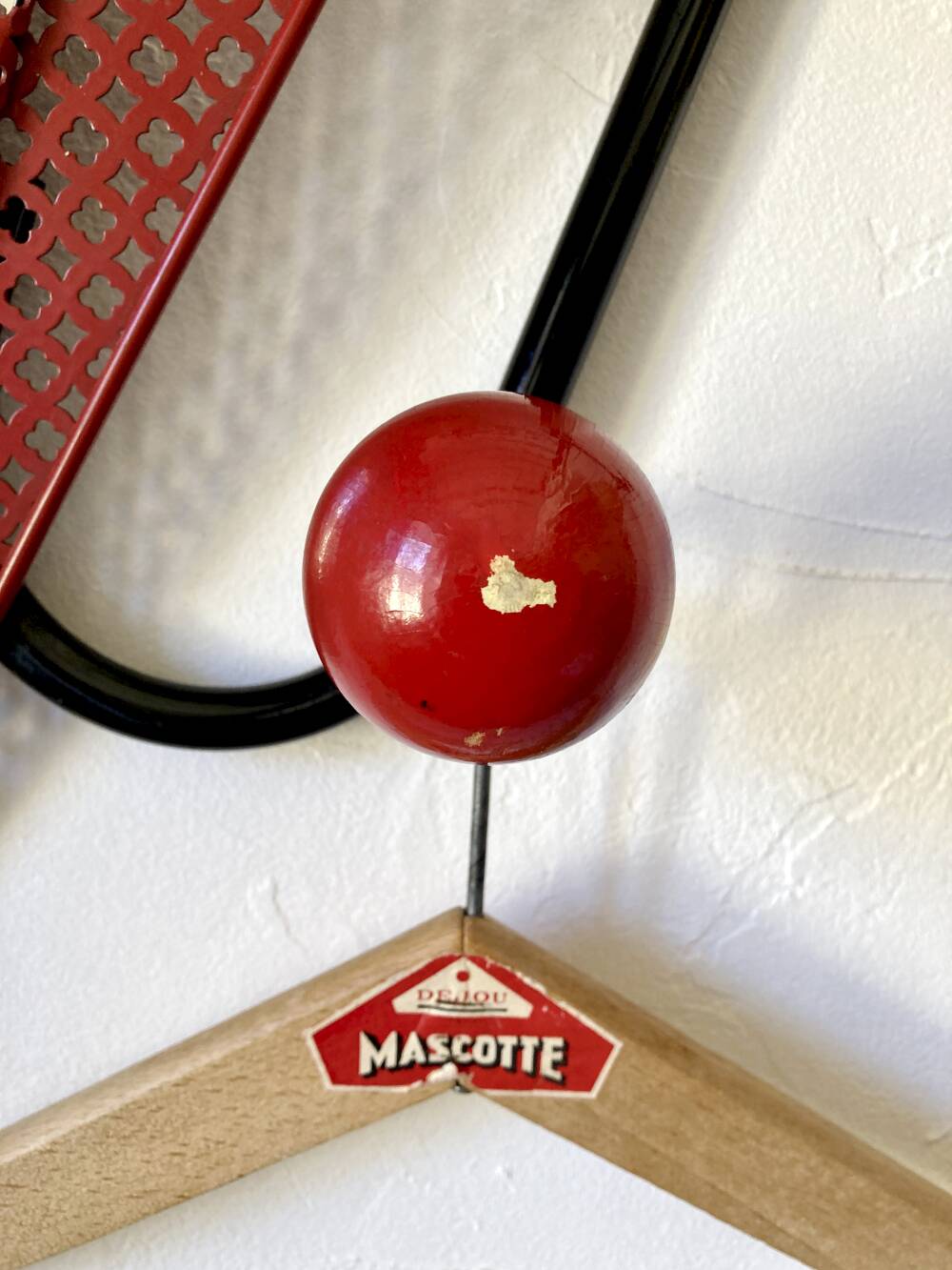 Wall coat rack, 1950s, attributed to Mathieu Matégot.