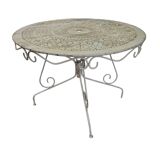 Old garden table in solid wrought iron