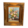 Still life painting with bouquet of flowers in a gilded wooden frame