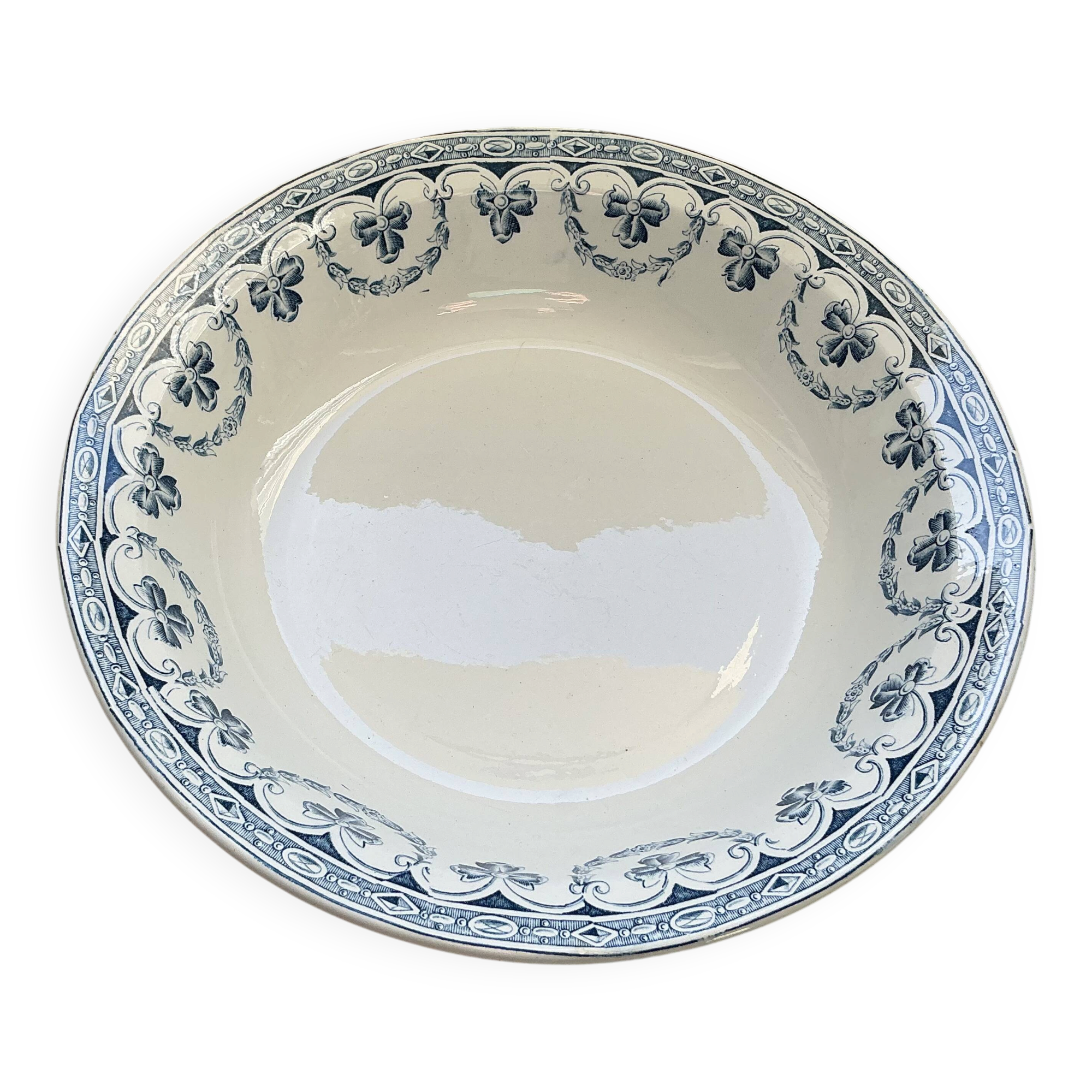 Old hollow dish in Ironstone with blue decoration by Amand & Hamage Santiago.