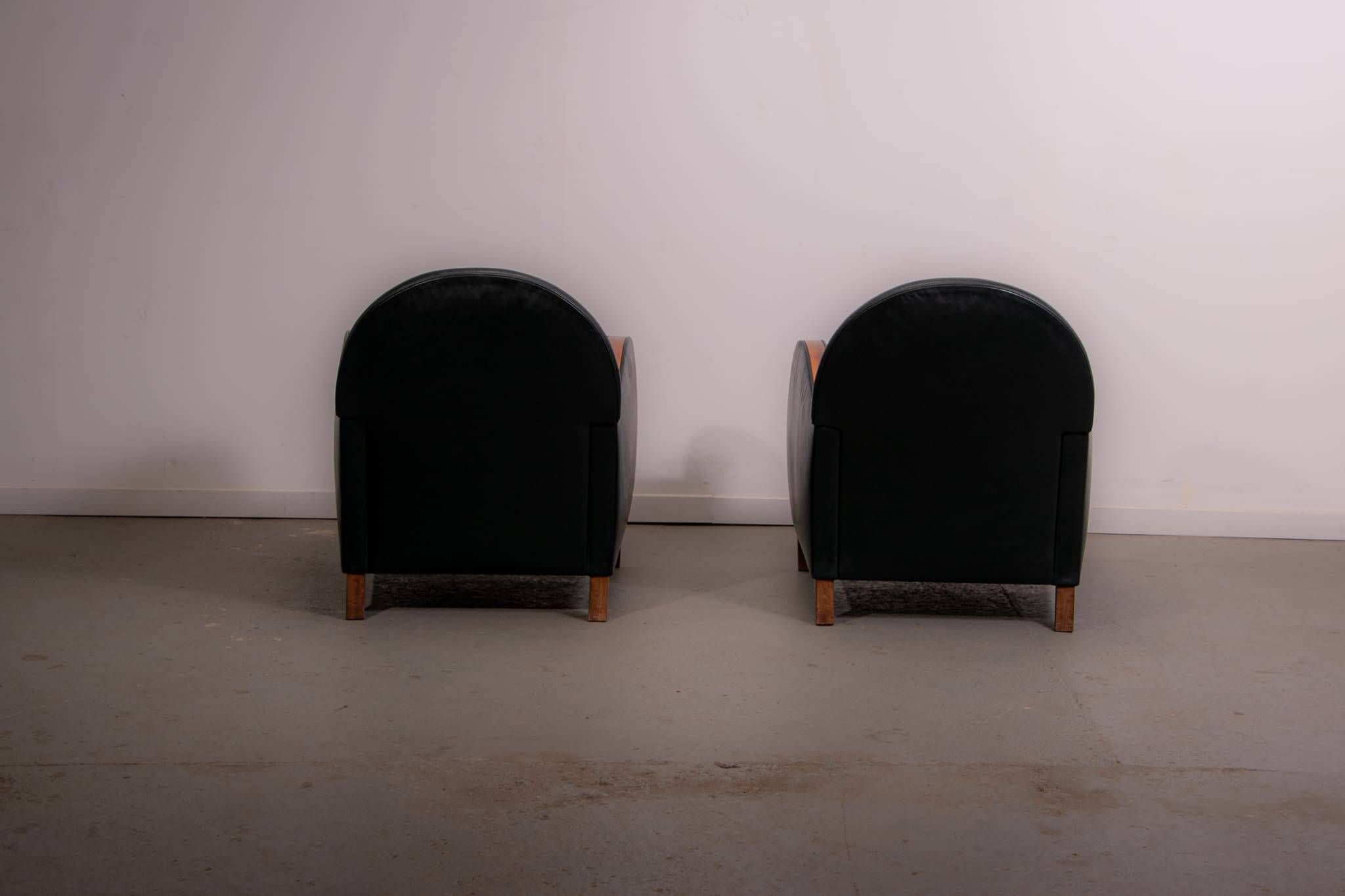 Pair of mid-century leather armchairs, circa 1970, made in Belgium.