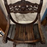 Curule Dagobert armchair in walnut