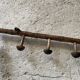 Old wooden wall coat rack