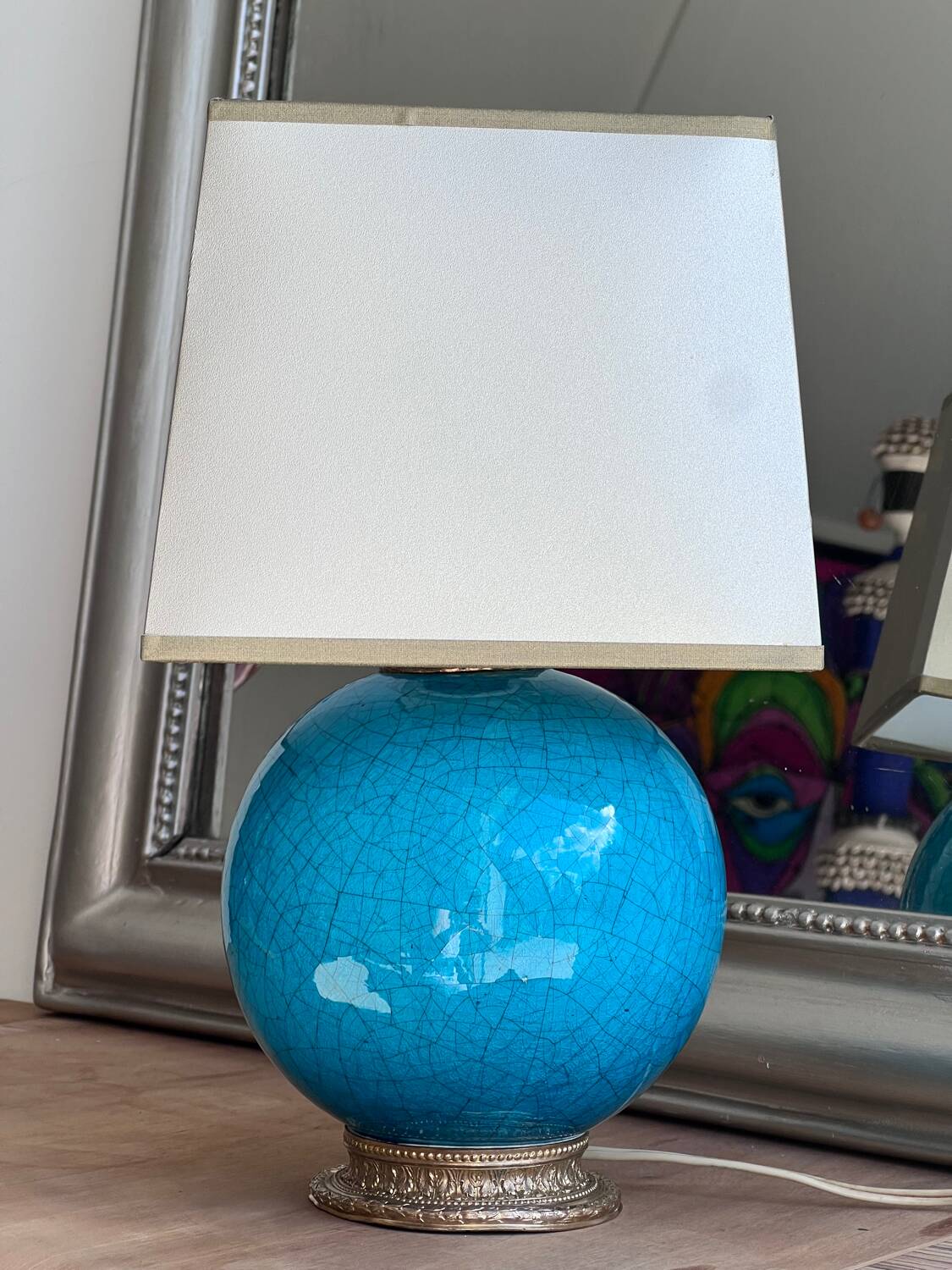Elegant turquoise crackled ceramic ball lamp, on a br base