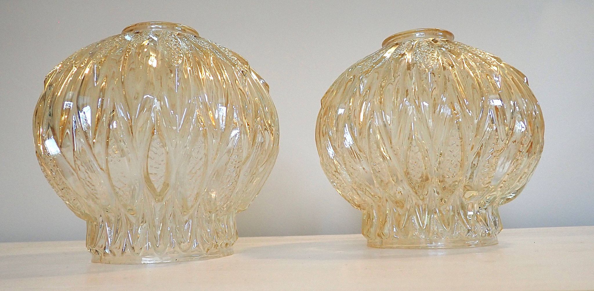 Pair of vintage globes for lighting - amber glass