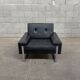 Pair of black leather armchairs