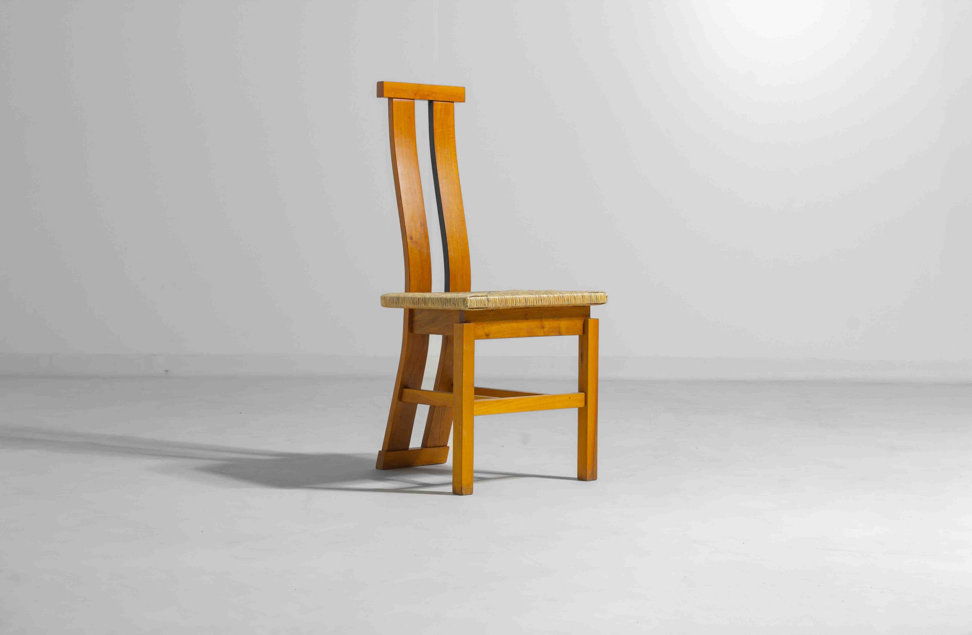 Sculptural postmodern dining chairs in wood with curved back, 1980s