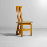 Sculptural postmodern dining chairs in wood with curved back, 1980s