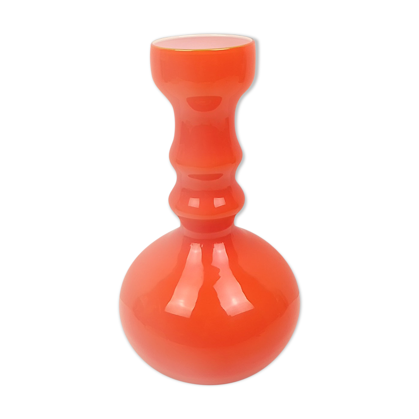 Orange glass vase and white interior