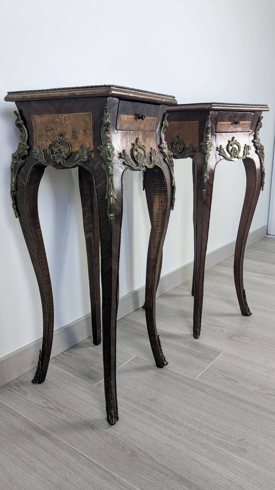 Pair of Louis XV bedside tables with marquetry and gilded bronzes