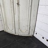 19th century curved corner cupboard in patinated oak