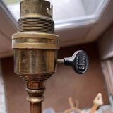 Rare articulated tripod base table lamp in gold-plated brass