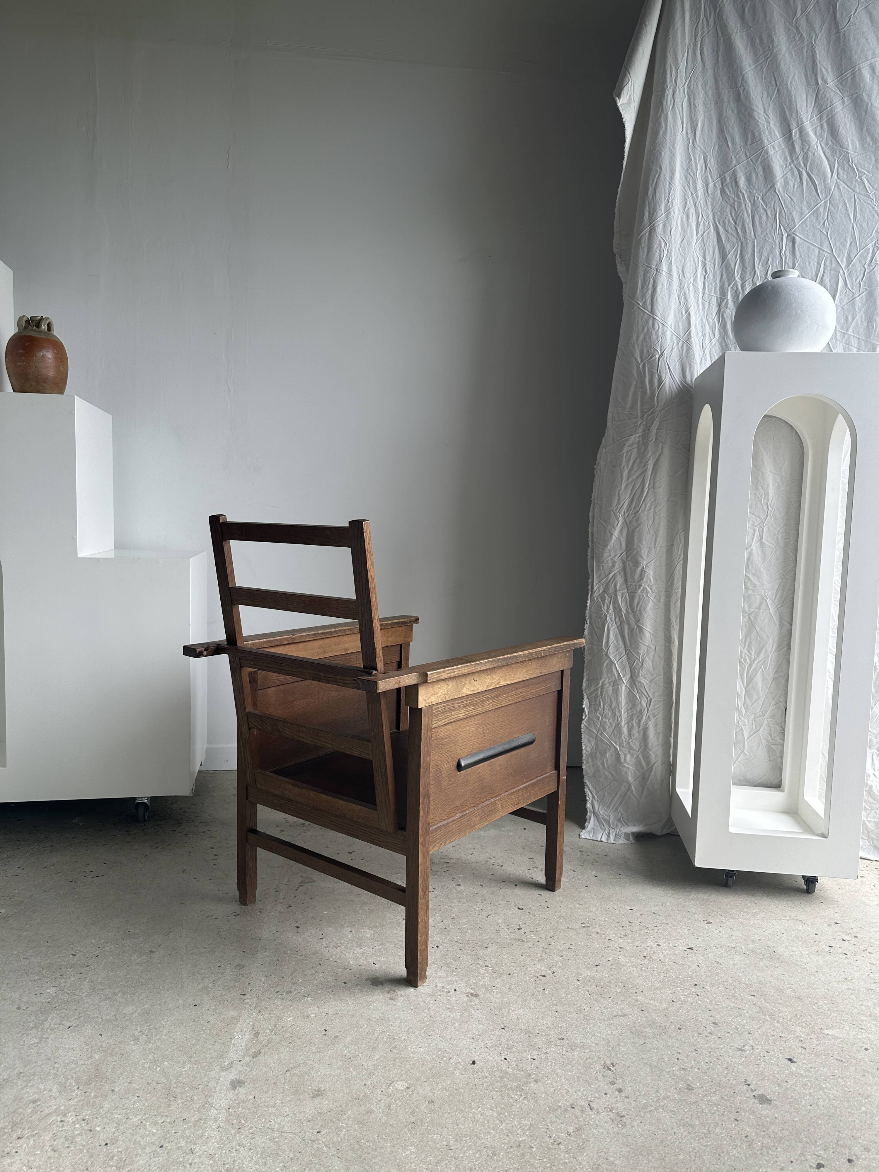 Large wooden armchair with adjustable reclining back