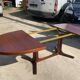 Baumann round oval extendable Scandinavian table in rosewood with 2 extensions.