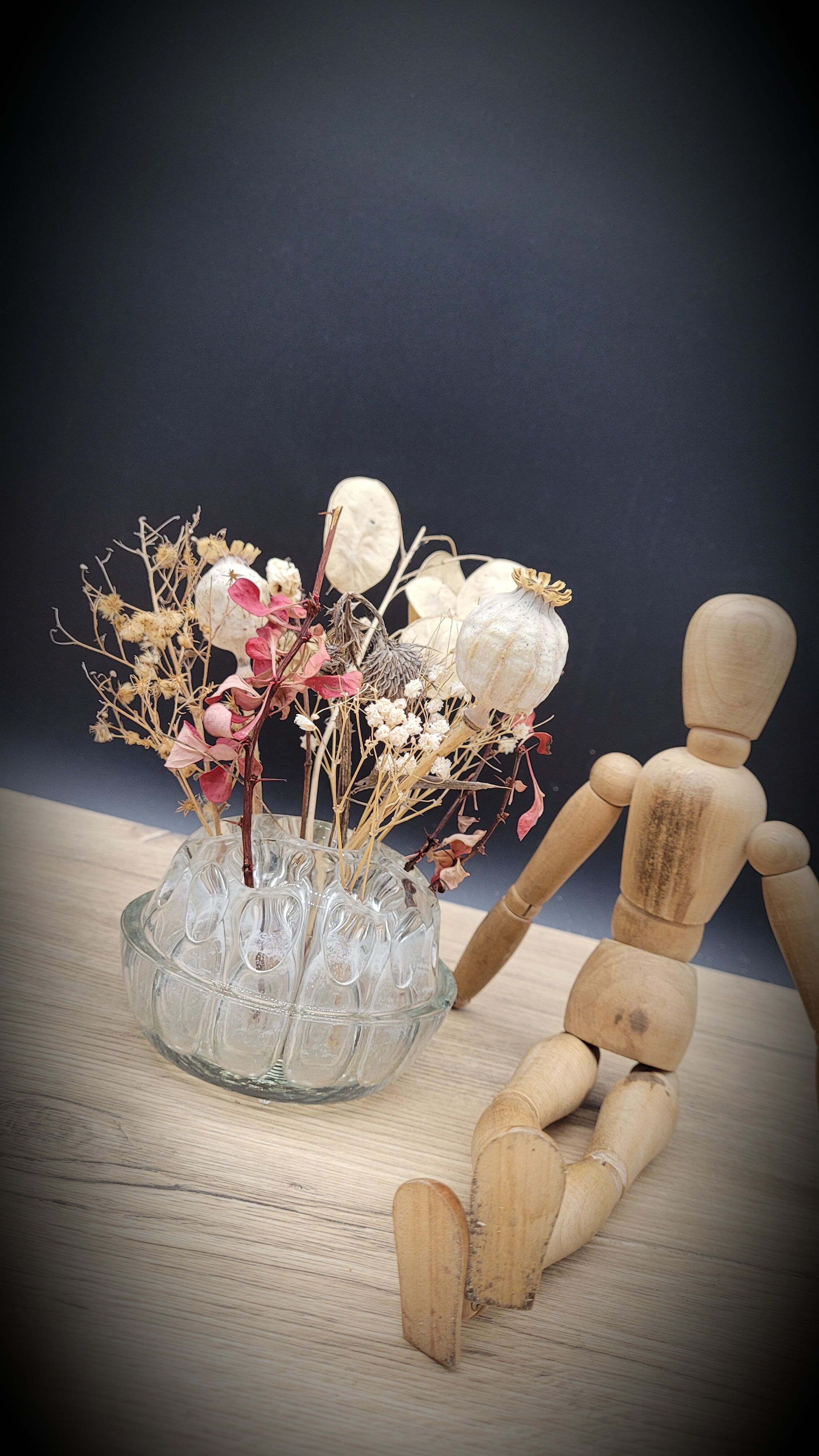 Pique flowers in glass of Reims