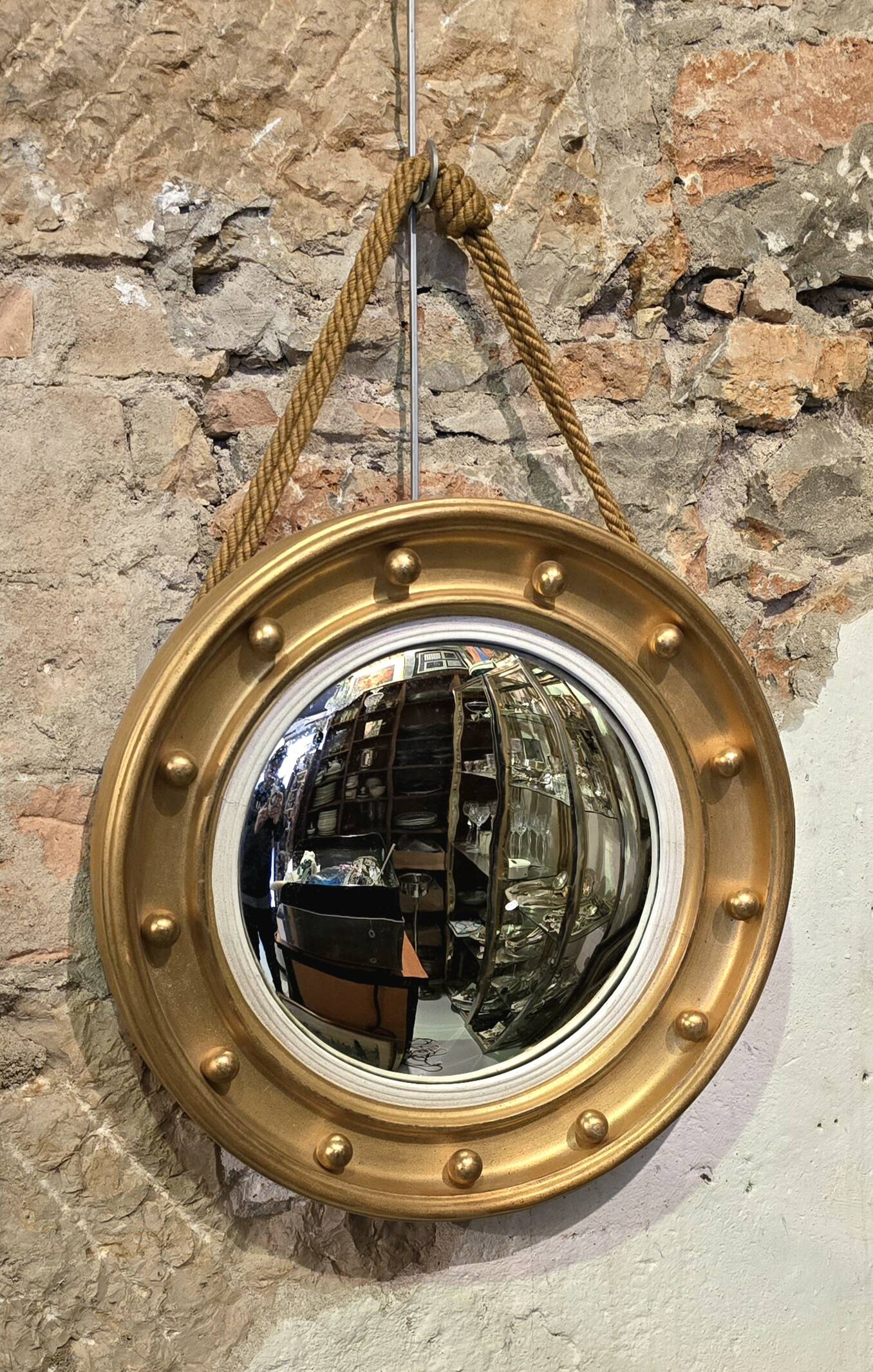Witch mirror porthole style in gilded wood, diameter 44 cm.