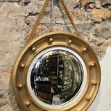 Witch mirror porthole style in gilded wood, diameter 44 cm.