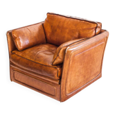 Vintage club armchair by Roche Bobois. Camel buffalo leather. France, 1980s.