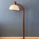 Mid-century floor lamp in brown wood by Steinhauer with an acrylic glass shade.
