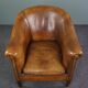 Club chair in patinated sheepskin
