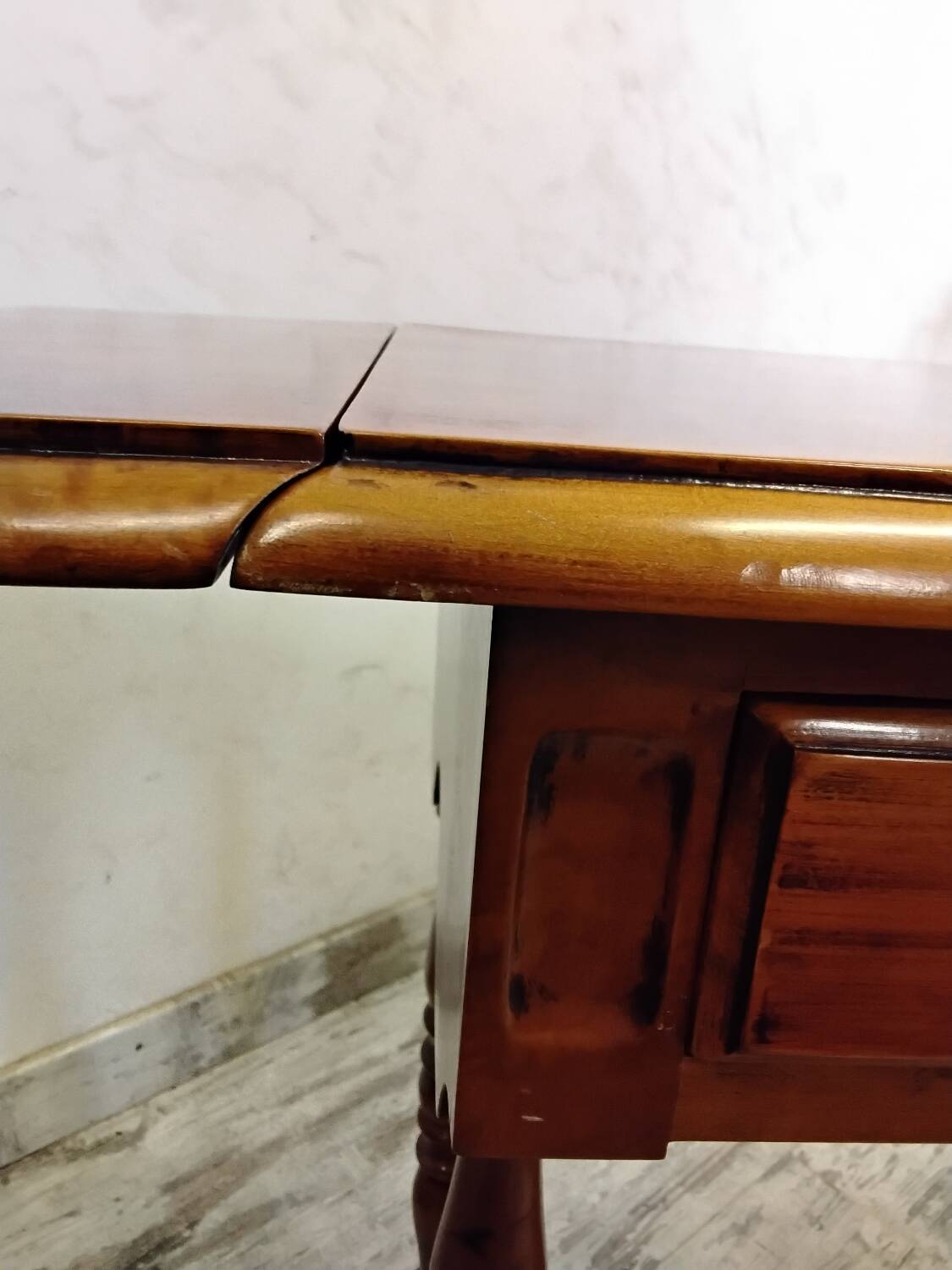 Small wooden drop-leaf table