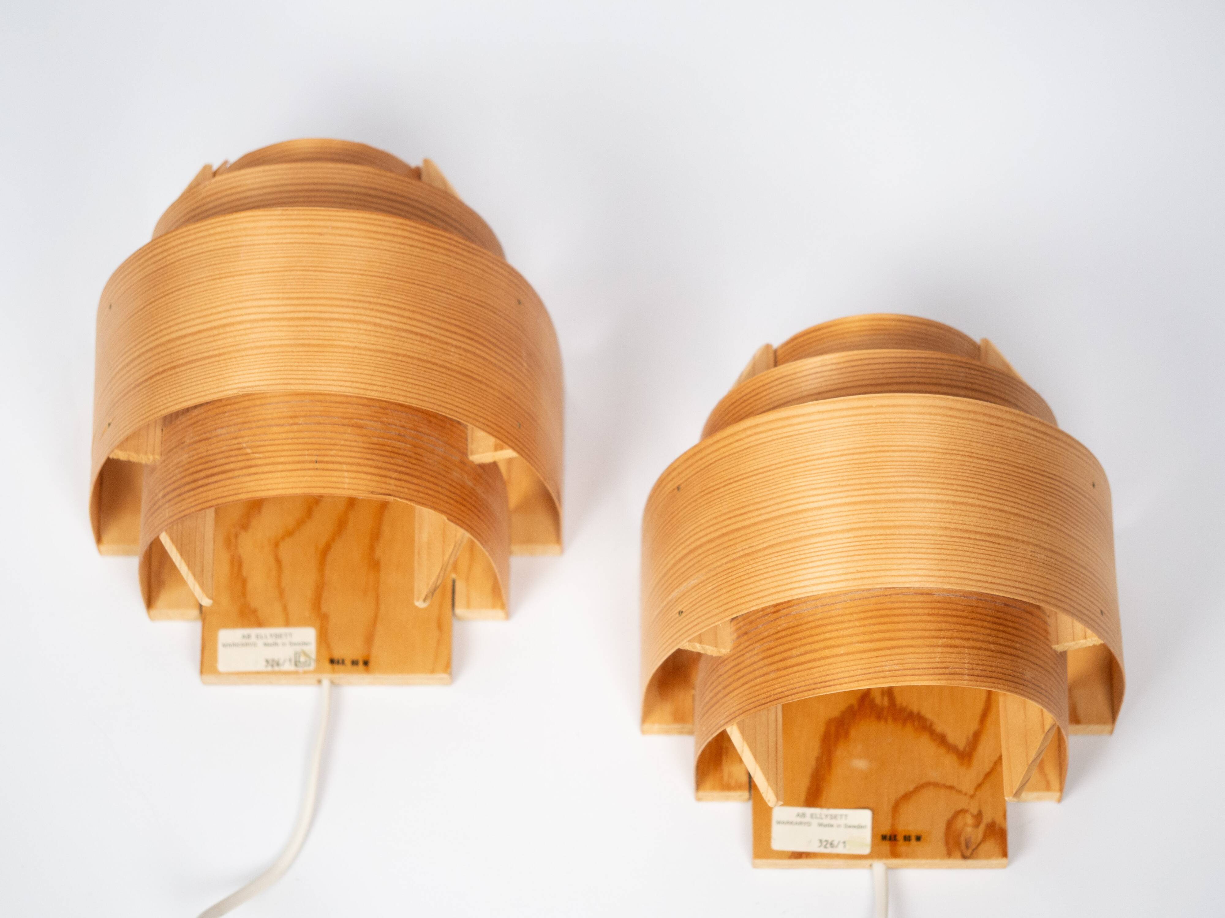 Pair of pine wood wall lamps V327 by Hans-Agne Jakobsson, AB Elysset, 1960s