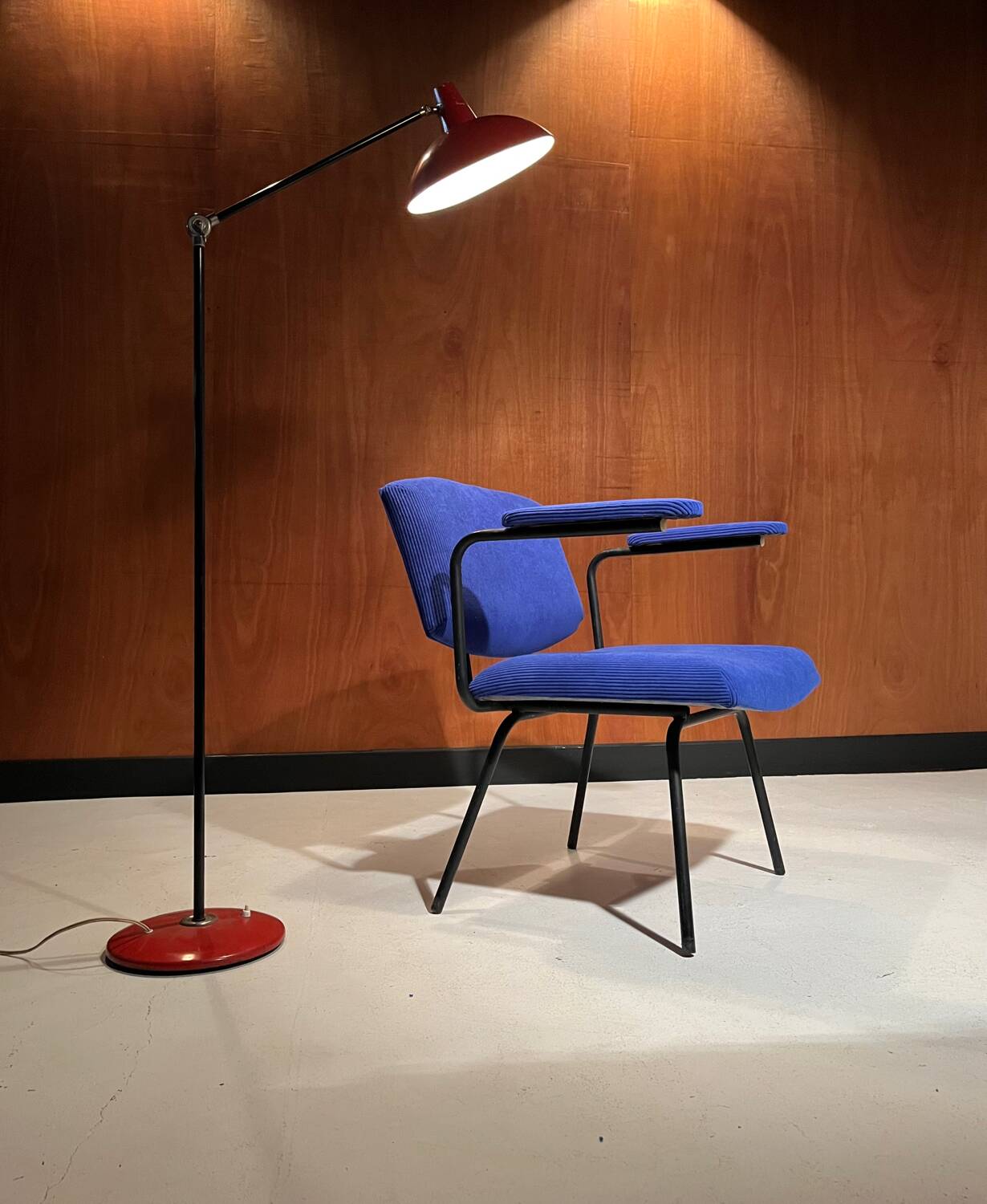 Vintage armchair and its footrest from around 1950.