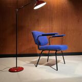 Vintage armchair and its footrest from around 1950.