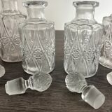 Set of 4 molded crystal bottles – Val Saint Lambert