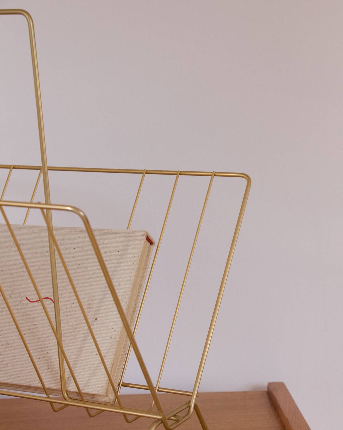 Vintage golden magazine rack